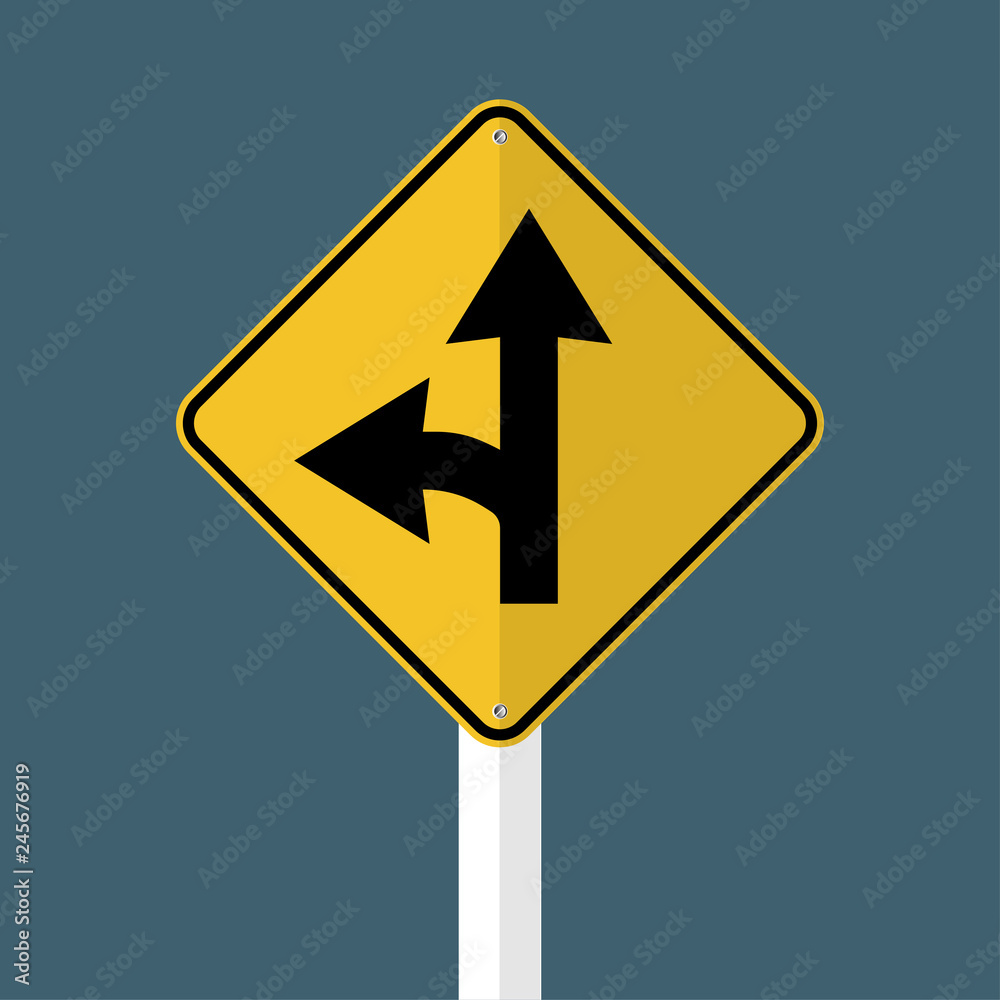Left turn split sign isolated on grey sky background.Vector illustration Left turn split sign isolated on grey sky background.Vector illustration