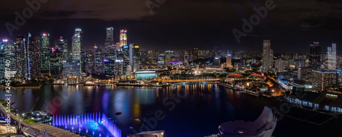 super wide panorama of Singapore skyscrapers at night