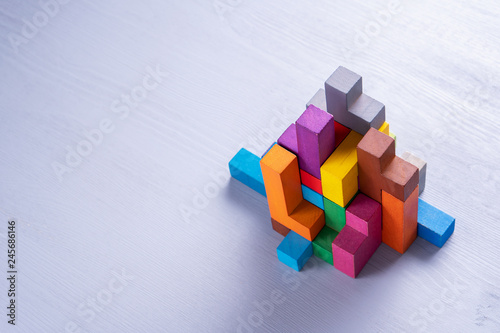 Abstract construction from wooden blocks shapes.