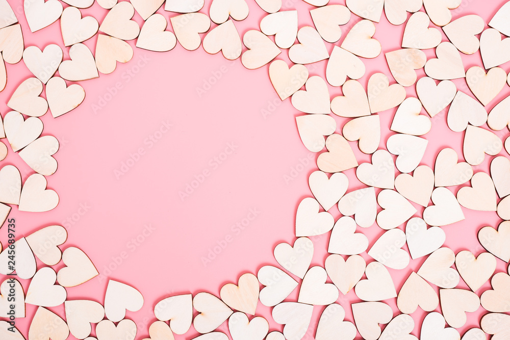 Wood hearts on pink background have sphere copy space, Wood hearts on pink background have sphere copy space,