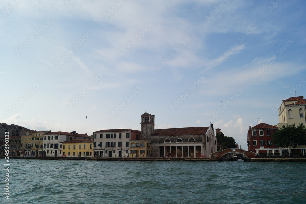 on a boat through the canals of venice