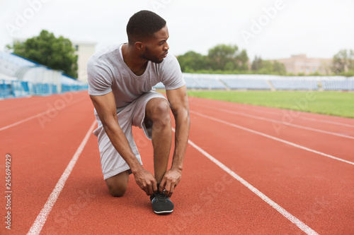 Sporty man preparing for run