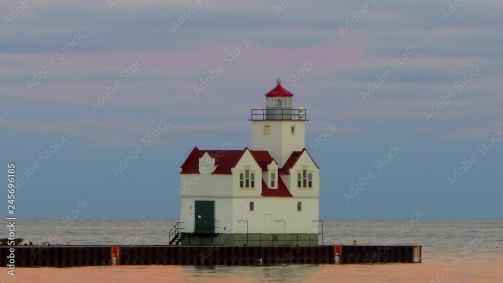 Zooming out time lapse of scenic lighthouse as day turns to night. Zooming out time lapse of scenic lighthouse as day turns to night.