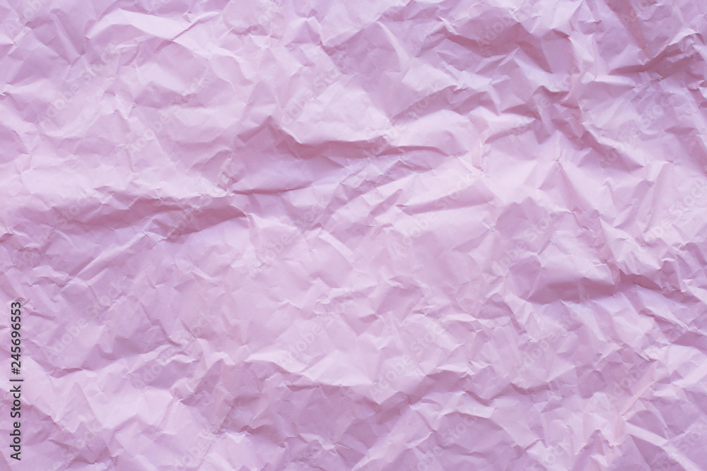 Fototapeta premium Pink crumpled recycle paper