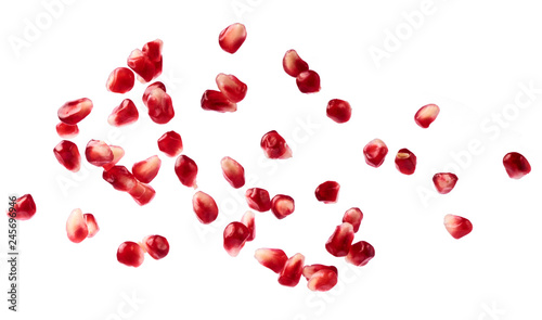 Fresh red pomegranate seeds. Closeup macro image.