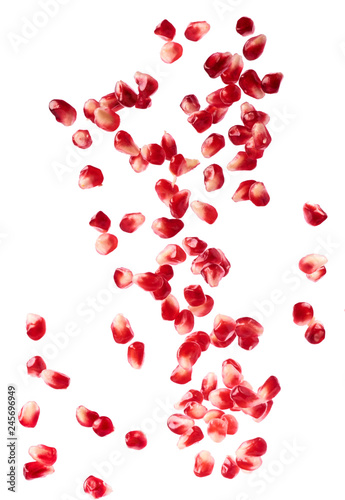 Fresh red pomegranate seeds. Closeup macro image.