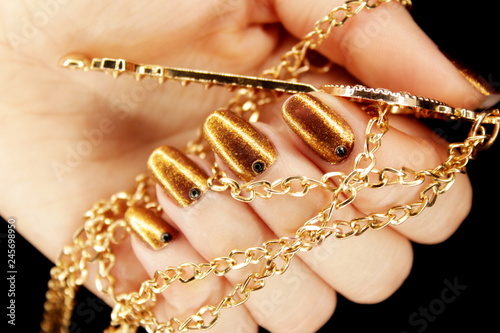 New Year's manicure, Christmas nail color, golden diamond key