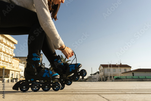 Girl with roller blade photo