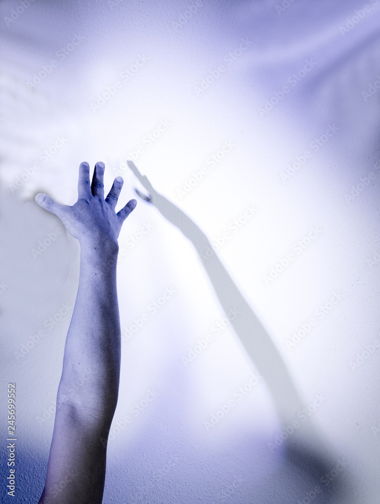 Fototapeta premium Extended arm with shadow