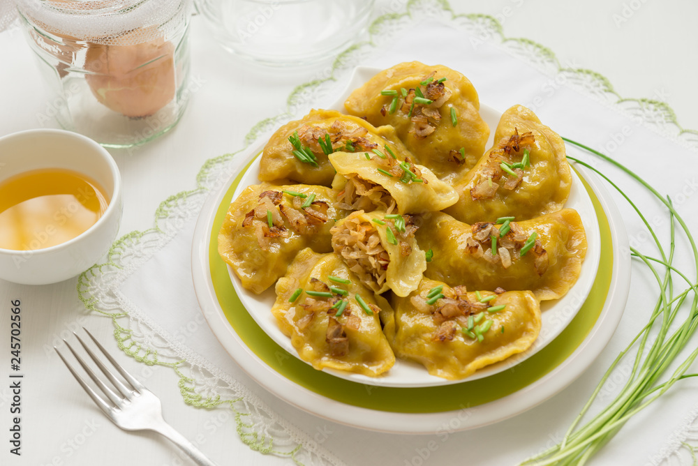 Dumplings with cabbage and fried onions. This is a very popular food in Poland, Ukraine and Russia