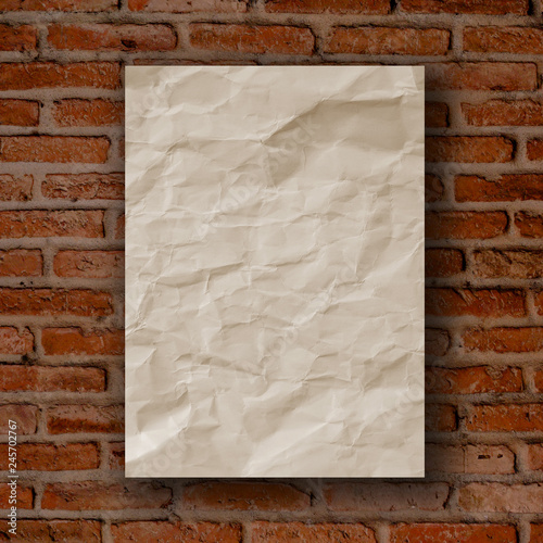 mock up crumpled paper poster frame on red vintage retro brick wall background texture for design and decorate interior concept 