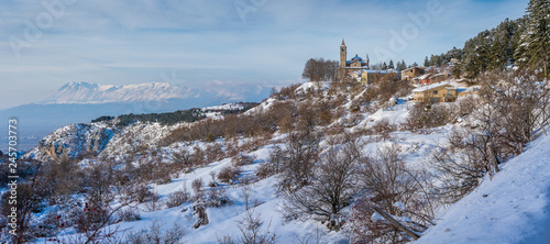 Panoramic sight of the small village of Gioia Vecchio during winter, near Pescasseroli, in Abruzzo National Park. Italy.