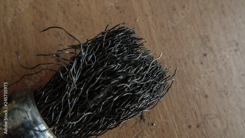 Brush on the metal on the table  