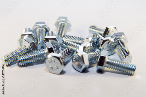 Bolts, metal screw or bolt on white background.
