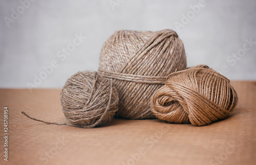Set of threads balls. Hemp, linen, cotton. Parcels materials. Packaging process.