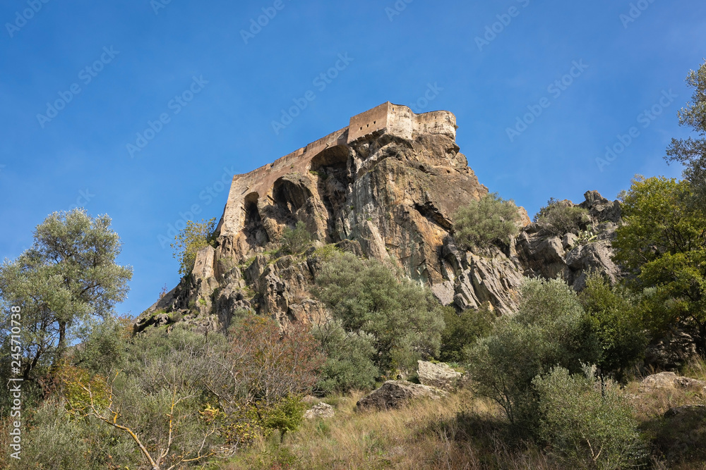 Bottom view of the historical citadel in the Corsican city of Corte, France Bottom view of the historical citadel in the Corsican city of Corte, France