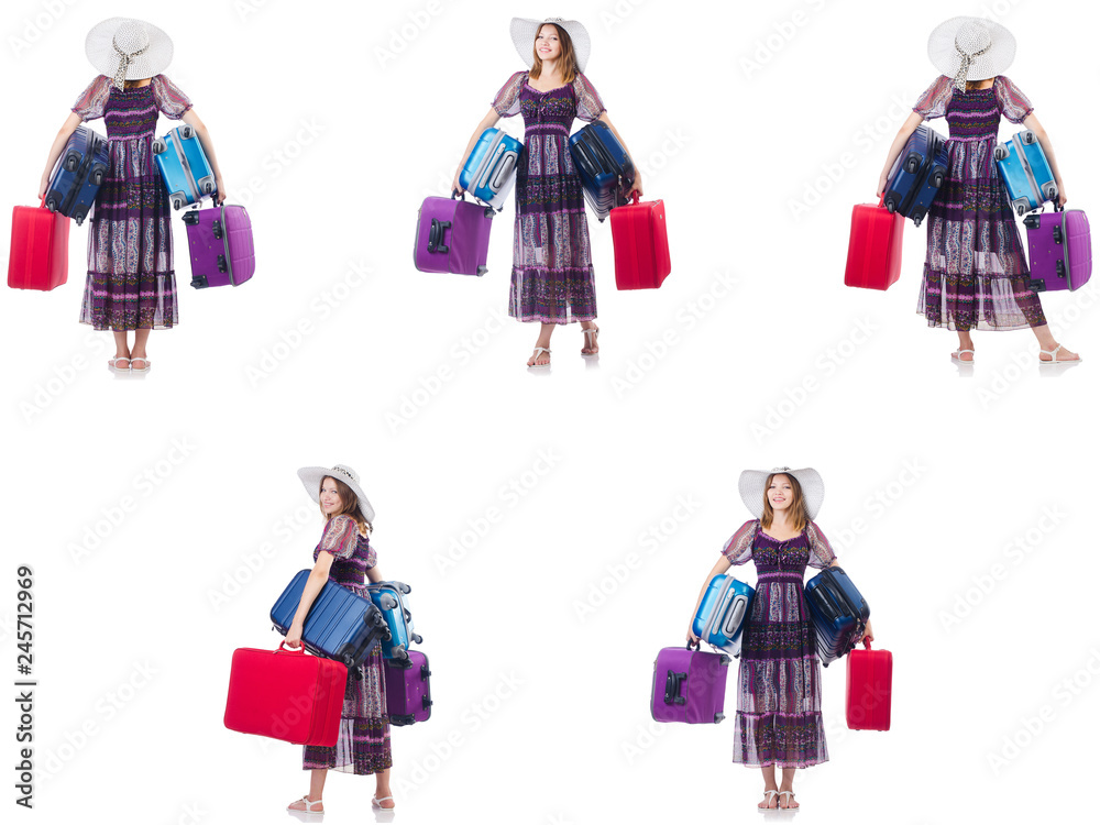 Young woman with suitcases isolated on white