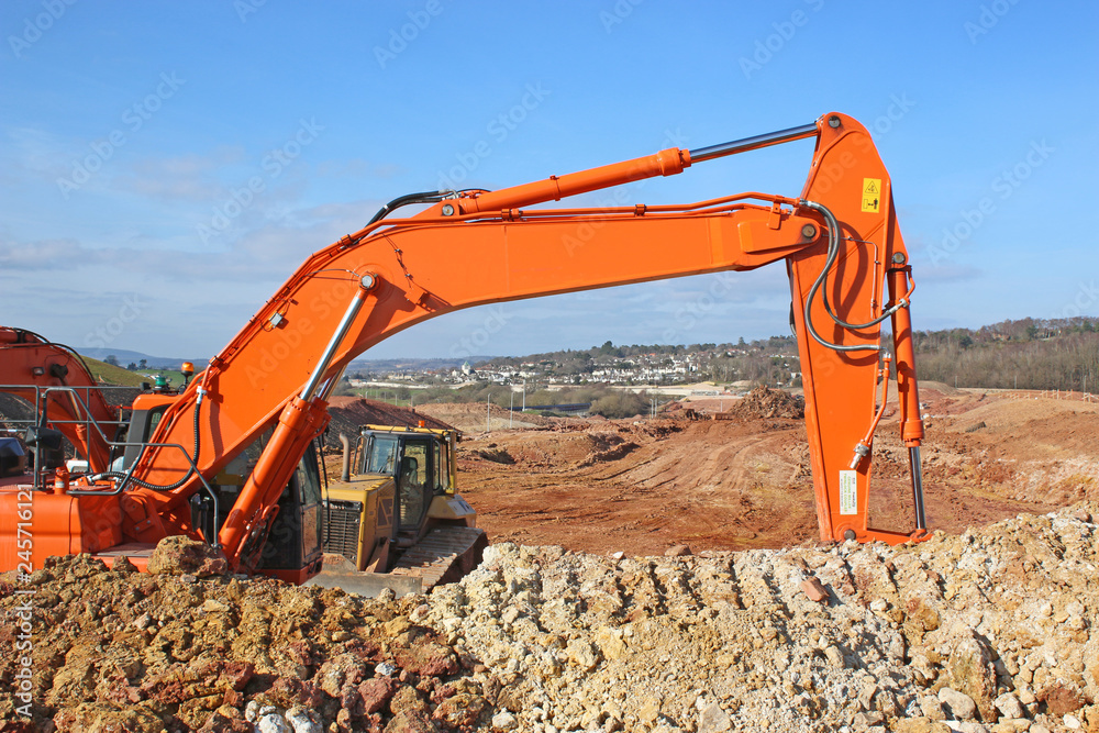 Obraz premium Digger on a road construction site