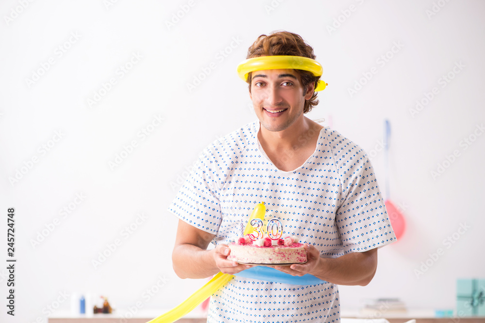 Young man celebrating his birthday in hospital