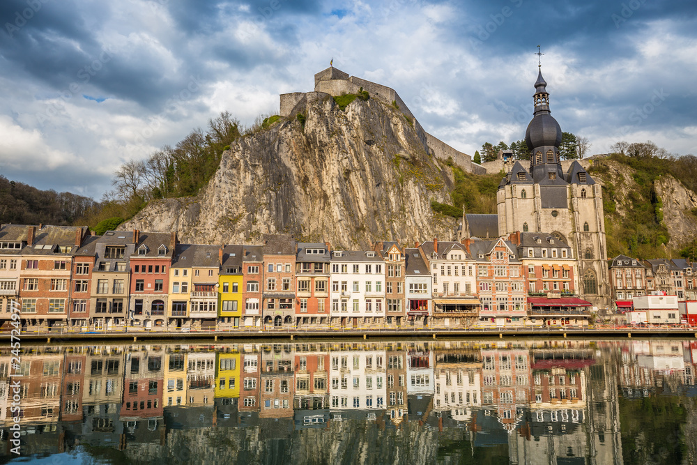 Historic town of Dinant with river Meuse at sunset, Wallonia, Belgium