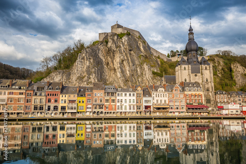 Obraz na płótnie Historic town of Dinant with river Meuse at sunset, Wallonia, Belgium w salonie