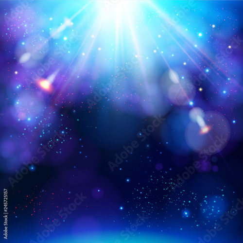 Sparkling blue festive star burst background with a dynamic bright white explosion of rays.
