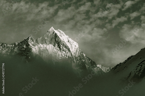 Starry sky over Machhepuchare and Annapurna Base Camp - Nepal, Himalayas photo