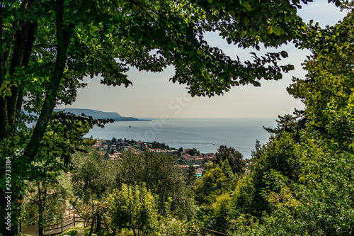 View on the Garda lake from the hills of toscolano Maderno, Brescia - Italy
