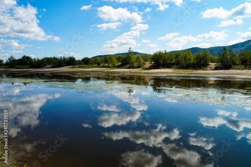 Samara  region  river  Volga  mountains  ditches  water  reflection  shore  blue  sky  white  clouds  shore  sand  forest  trees  nature  walk