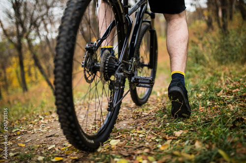 Cycling outdoors, close up of the feet near pedal. Close up