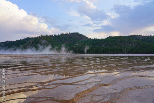 Sunset fumes over the Grand Prismatic pool in Yellowstone National Park, United States