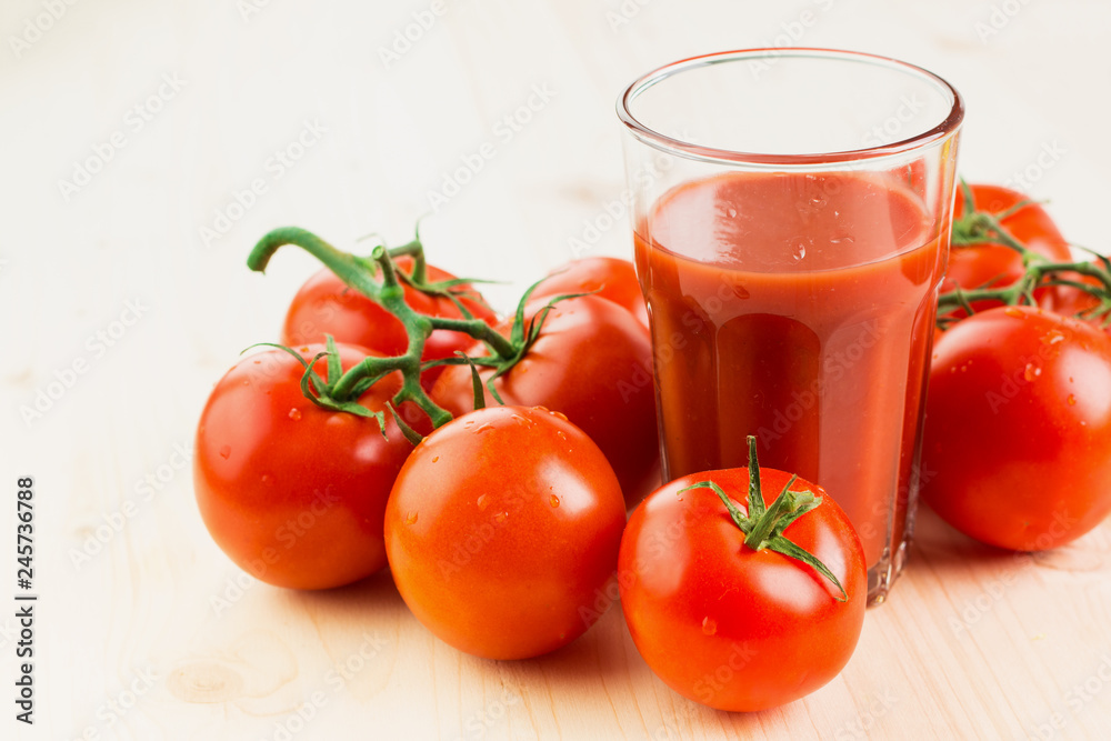 Glass of tomato juice with tomatoes Glass of tomato juice with tomatoes