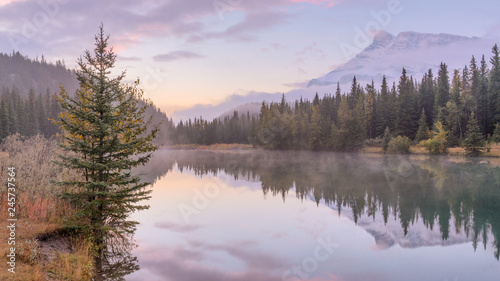 Morning mist on the Cascade Pond with beautiful water reflection at Banff National park © LeeSensei