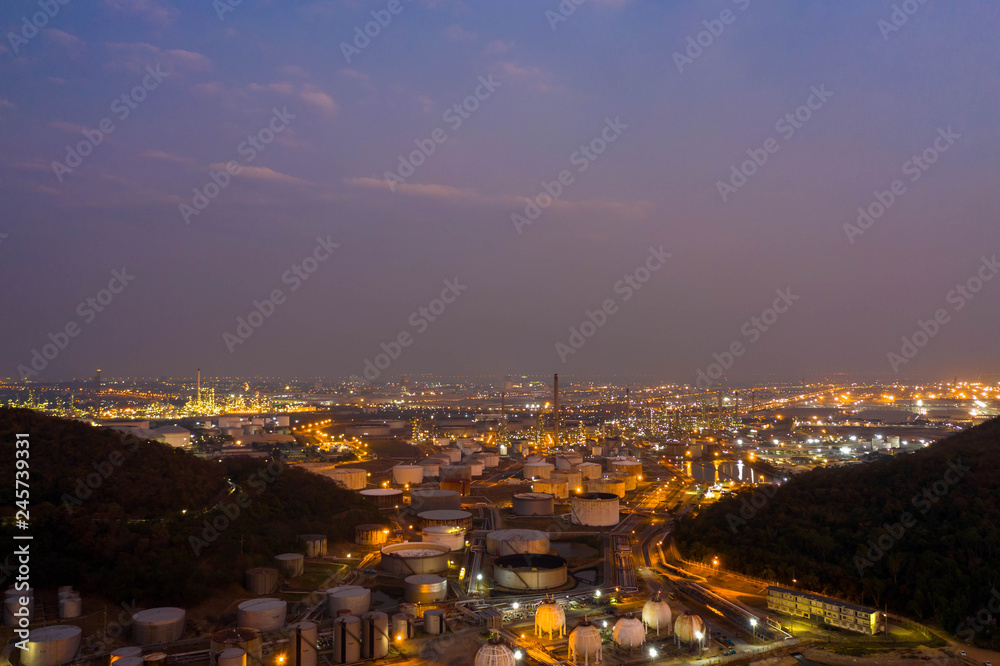 Aerial view. oil refinery factory and Oil industry at twilight. Petrochemical Industrial. - obrazy, fototapety, plakaty 