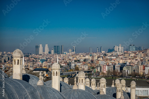 Cuadro en lienzo Istanbul panorama in a daytime blue haze, with minarets of mosques in the foregr