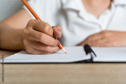 Hand and pencil pictures of students writing Education concept With copy space