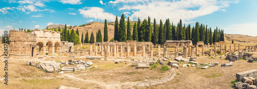 Panorama ancient Greco Roman city. Ruins of ancient city, Hierapolis in Pamukkale, Turkey. Ruined ancient place photo