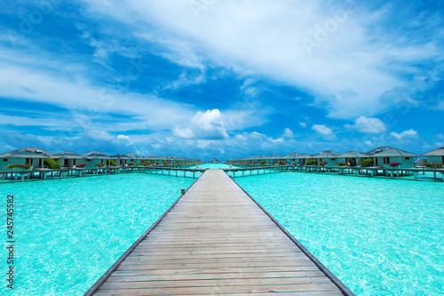 Maldives water bungalow on ocean water landscape