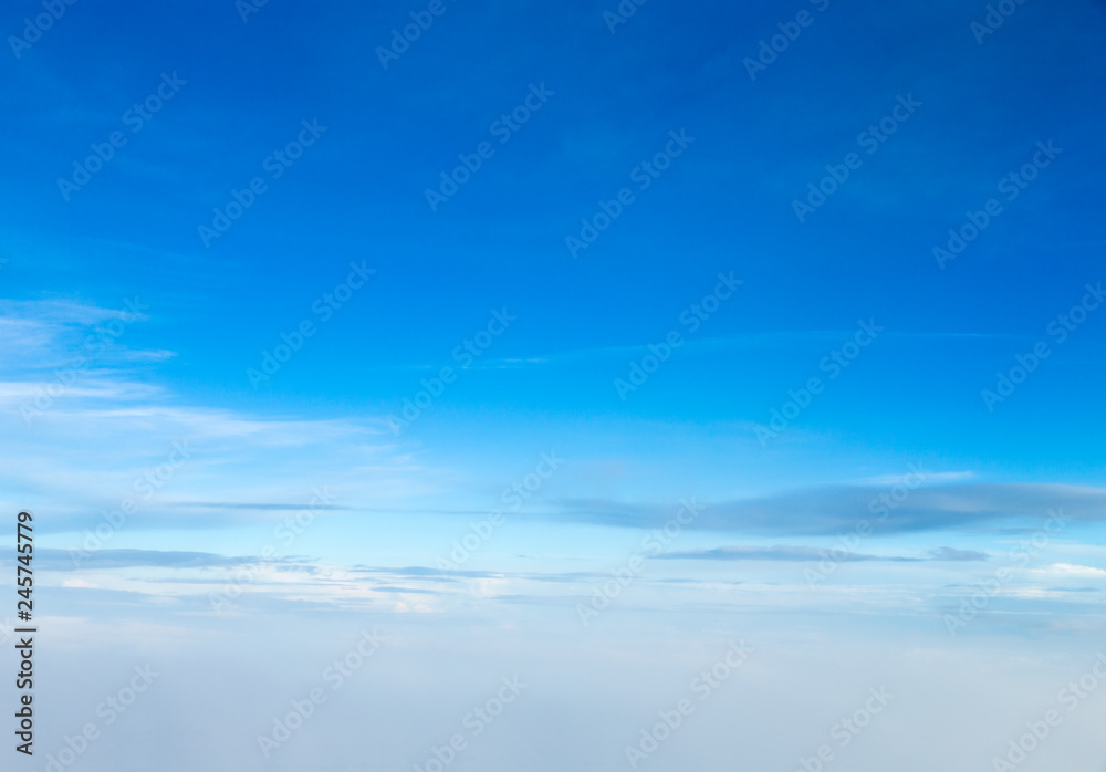 blue sky background with tiny clouds blue sky background with tiny clouds