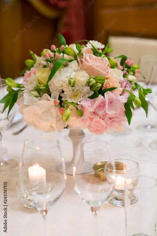 tables served and decorated with flowers for a wedding dinner tables served and decorated with flowers for a wedding dinner