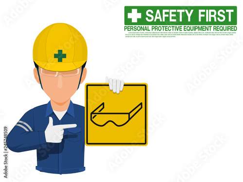Industrial worker is presenting safety glasses sign