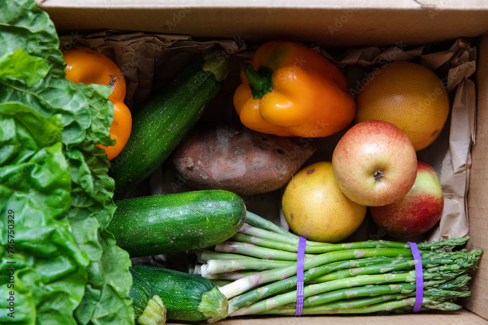 Fresh fruit and vegetables in a box