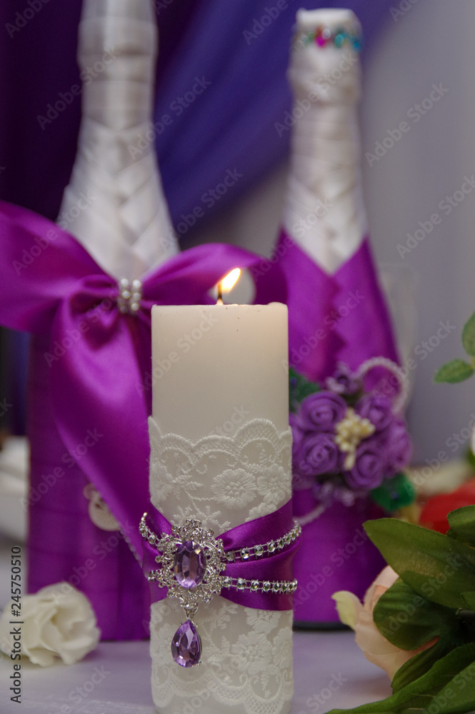 Elements of the wedding ceremony. Вurning candle from a wedding ceremony in a restaurant. Wedding decoration.