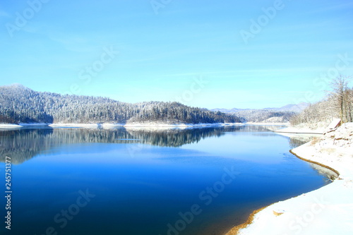 Lake and forest in winter; Gorski kotar area, Croatia