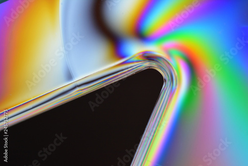 Ruler with cross polarization effect, isolated on a black background