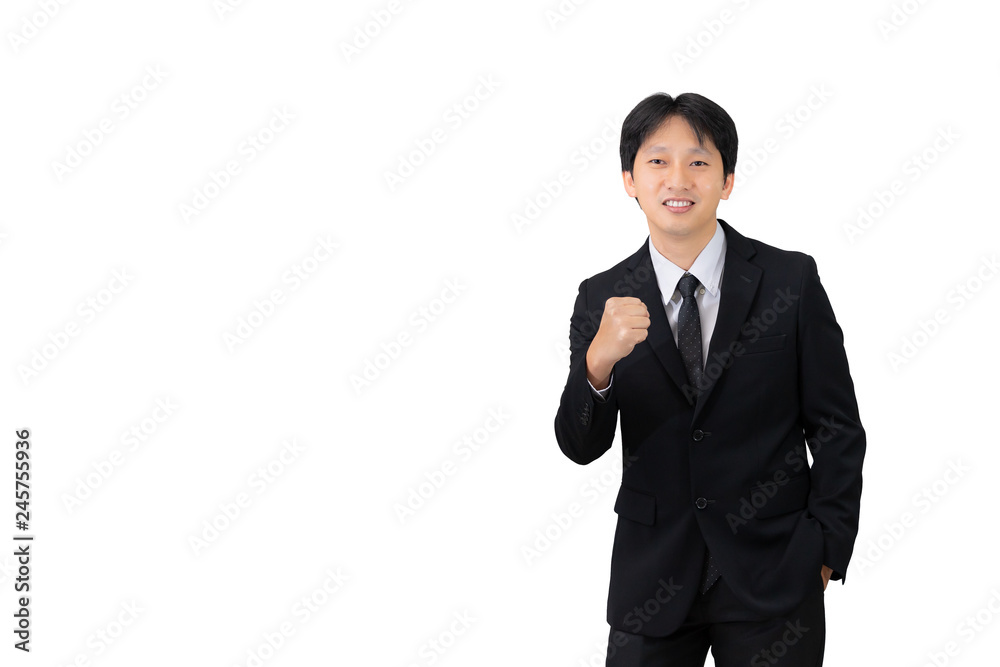 Close up portrait of Asian young handsome business man wearing suit with tie is smiling and pointing on a copyspace with his finger on the white background Close up portrait of Asian young handsome business man wearing suit with tie is smiling and pointing on a copyspace with his finger on the white background