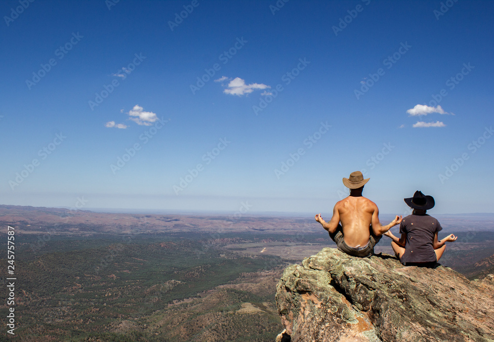 jung women and men sitting on St Mary's Peak from the Flinders Ranges National Park