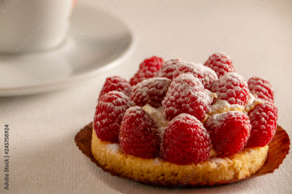 beautiful raspberry cake on a white background, side view beautiful raspberry cake on a white background, side view