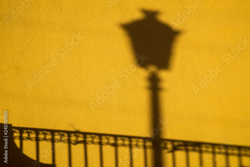 Shadows on yellow wall
