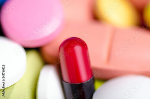 Colorful pills capsule medical medicine pharmacy drug macro blur background